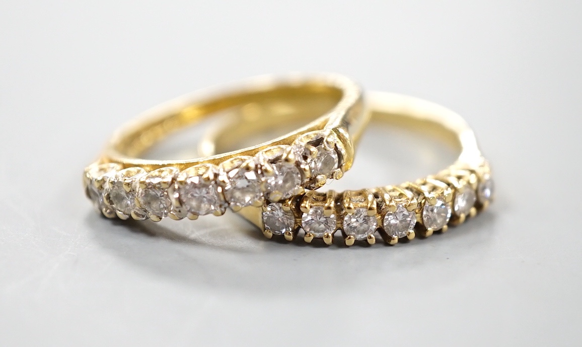 Two modern 18ct gold and seven stone diamond set half eternity rings, sizes M and Q/R, gross 5.9 grams.